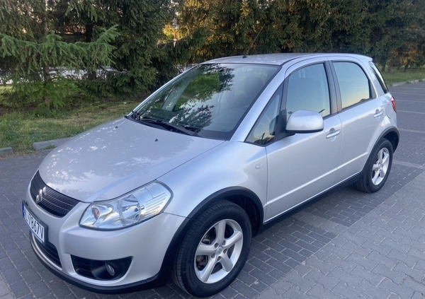 Suzuki SX4 cena 21900 przebieg: 156500, rok produkcji 2010 z Legionowo małe 232